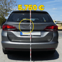 Heckschaden Opel Astra Kombi in Grau mit Gutachter Zollstock